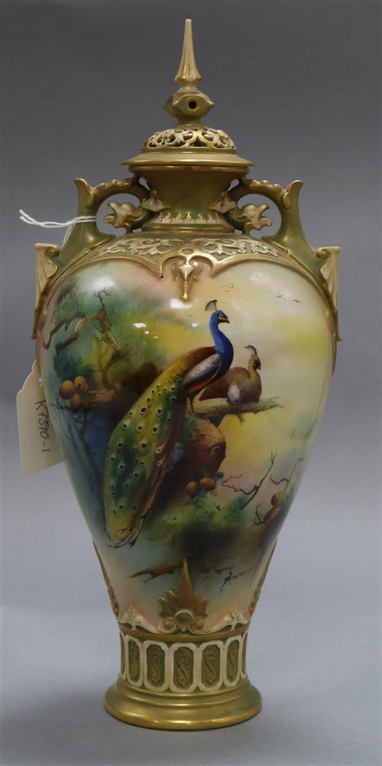 A Royal Worcester peacock vase and cover height 33cm